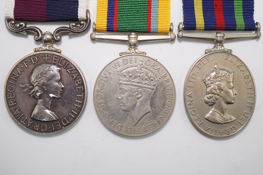 Three assorted service medals; GVI Cadet Forces medal to ACT. FG. Off. A. Liddell R.A.F.V.R (T); ERII Civil Defence Long Service medal unnamed; ERII RAFLSGC to E2418184 Cpl G R B Lowe RAF. Condition - fair to good.